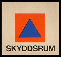 Bild på symbol för skyddrum - blå triangel på en orange kvadrat